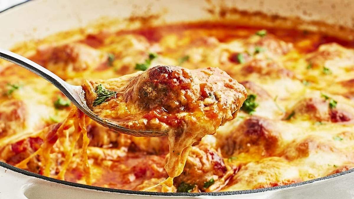 A shared comfort food recipe for spaghetti and meatballs, served in a pot.