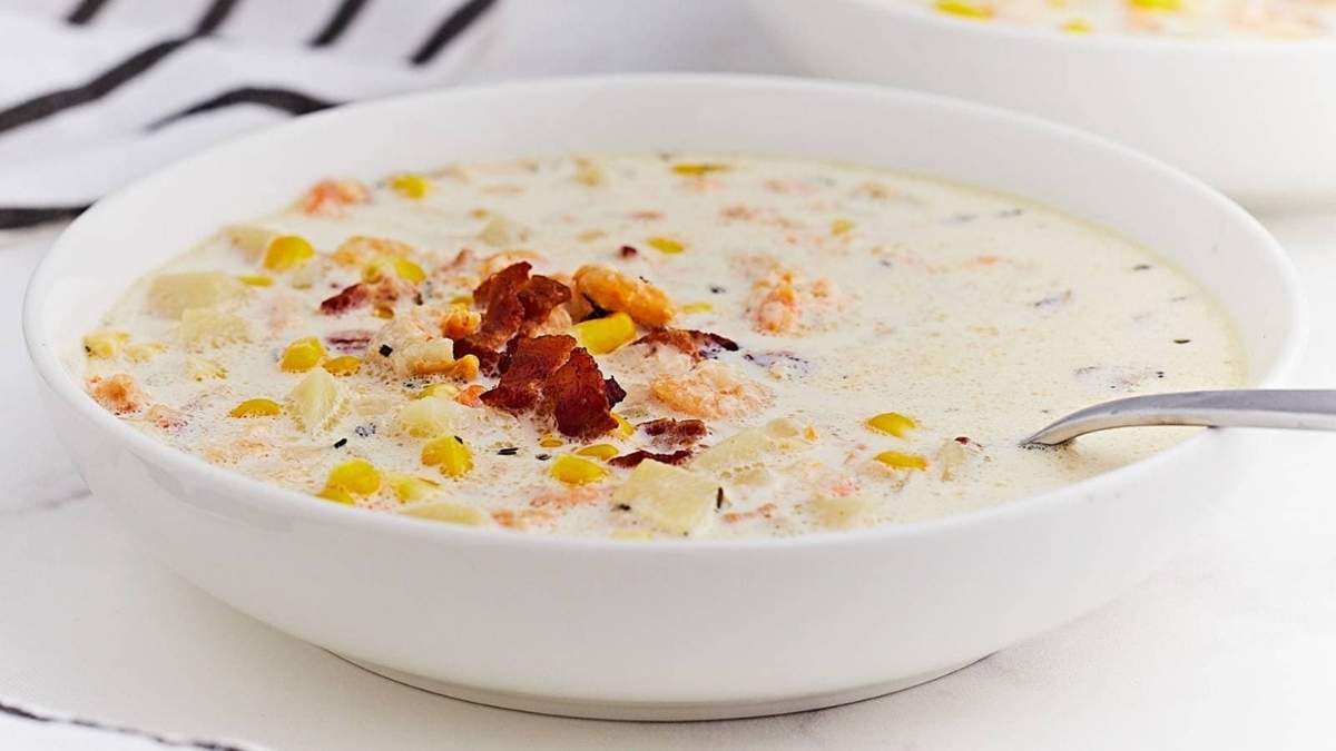 Comfort Food Recipes: Two bowls of chowder with bacon and corn.