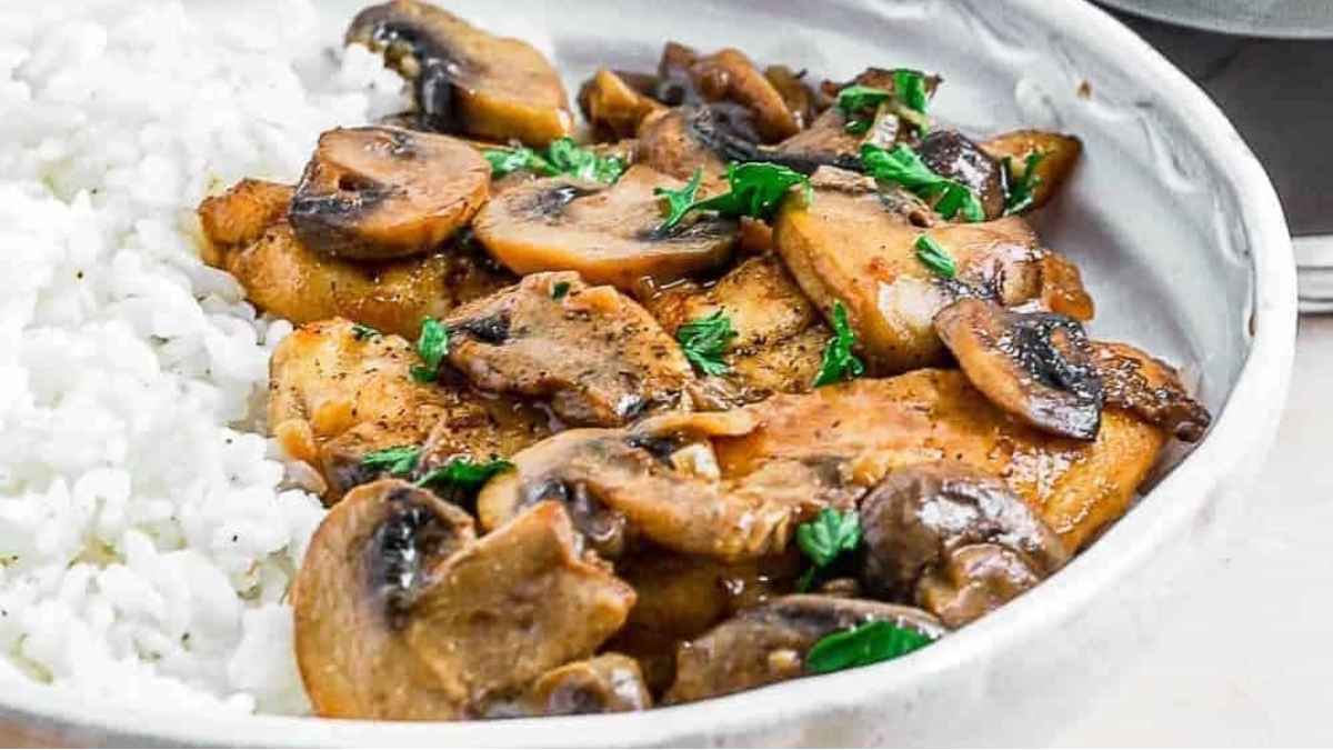 Chicken marsala with rice and mushrooms.