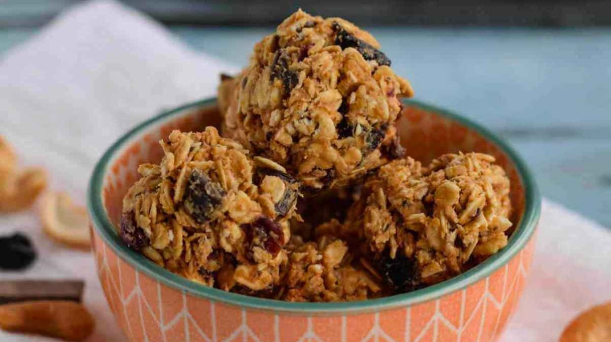 Chocolate cashew energy balls in a bowl.