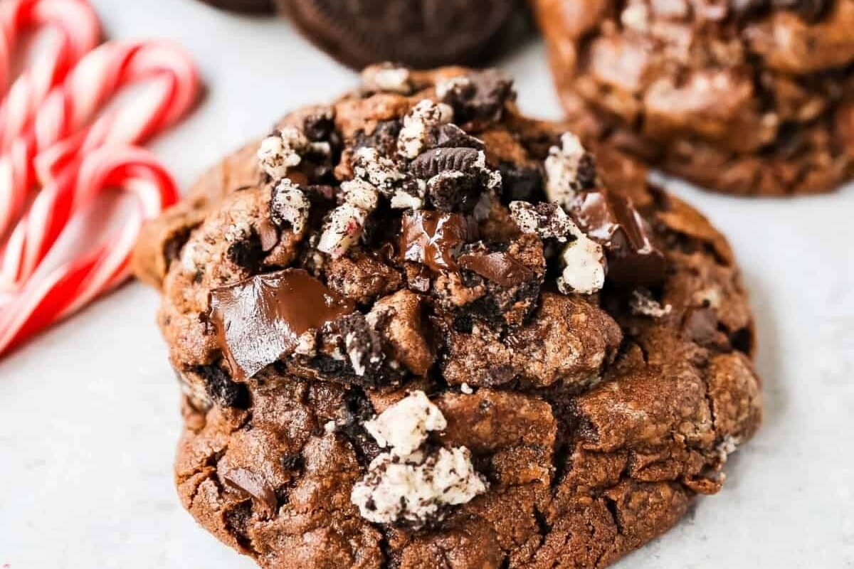 Delicious chocolate oreo cookies with a festive twist of candy canes. Enjoy the perfect blend of chocolate and peppermint in these delightful candy cane cookie treats!