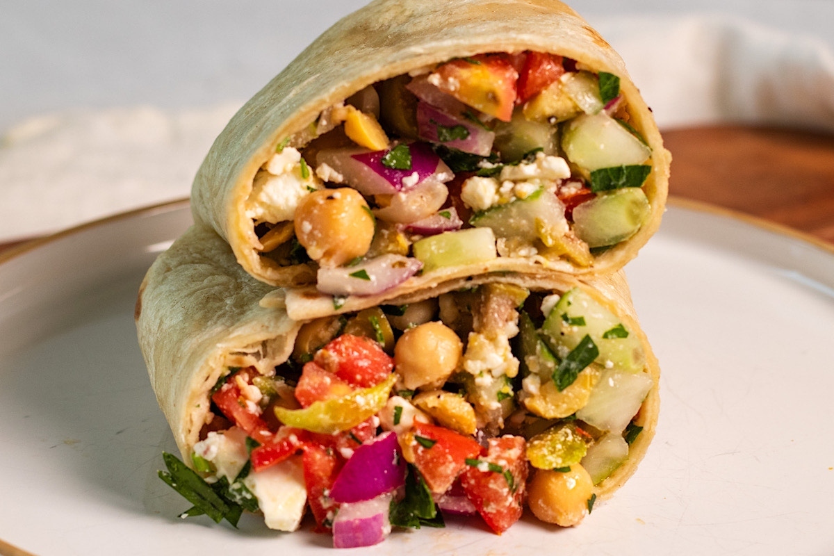 Greek vegetable loaded chickpea burrito.