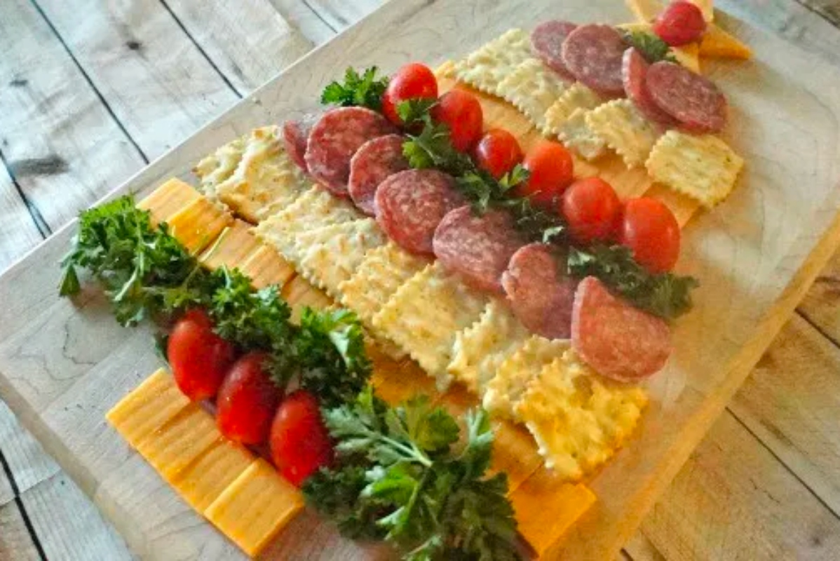 A cheesy Christmas tree made of appetizers.