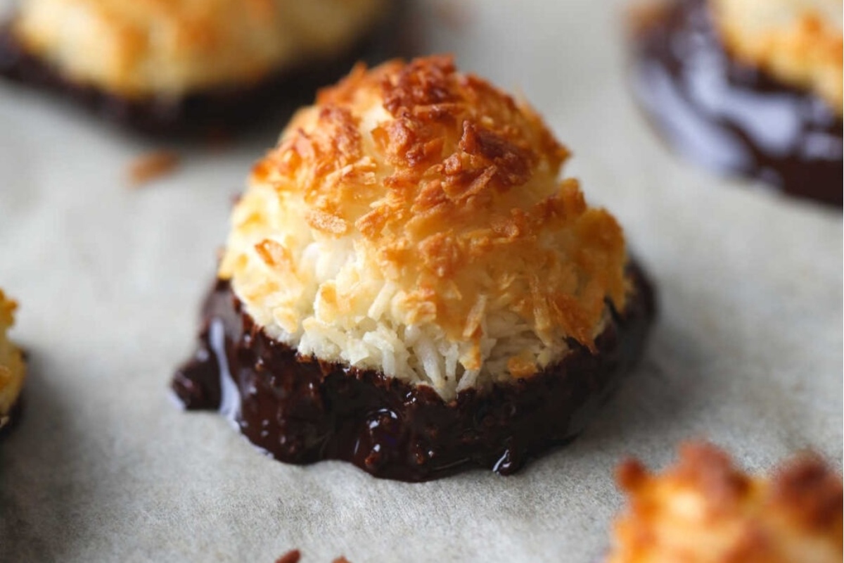 Christmas Coconut Macaroons with Chocolate Icing on a Baking Sheet.