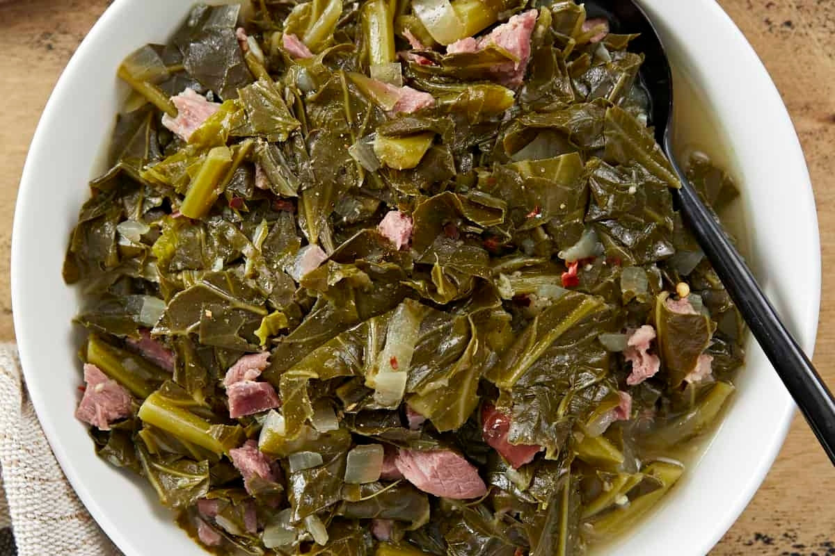 Christmas side dish of cole slaw and ham served in a bowl.