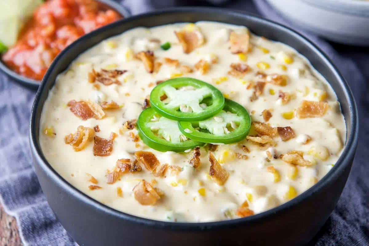 Cheesy cream cheese corn dip with jalapenos.