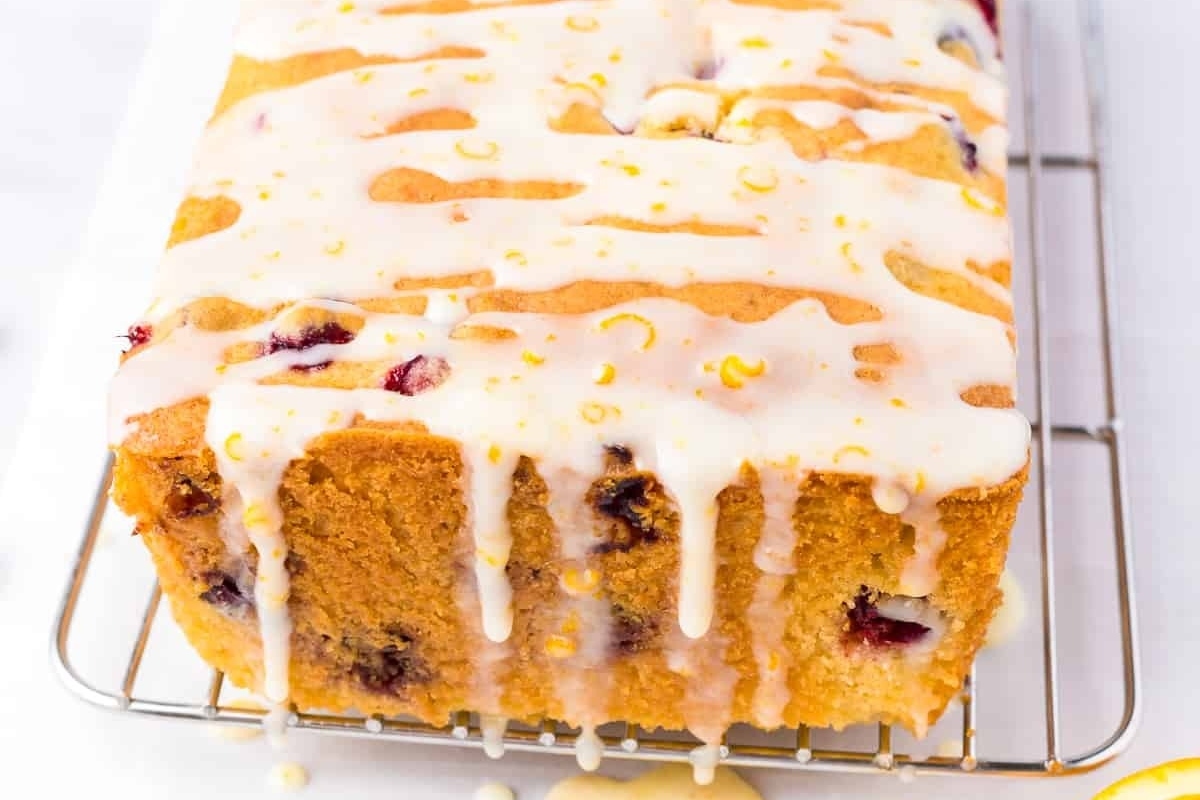Cranberry bread on a cooling rack.