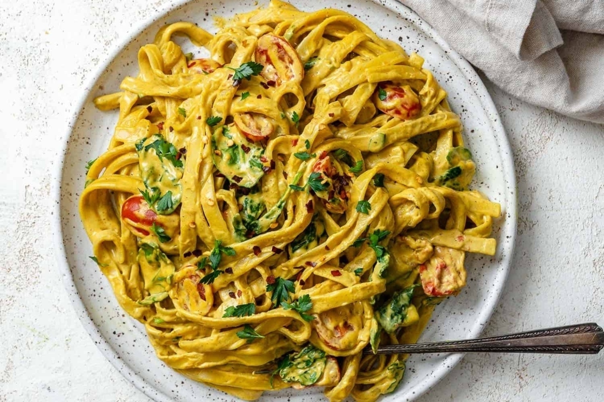 An inexpensive family dinner with pasta and broccoli.
