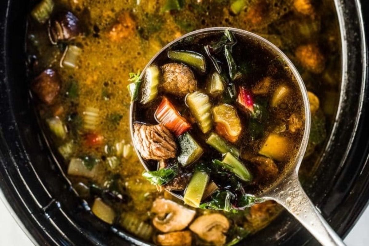 A vegetable soup in a crock pot.