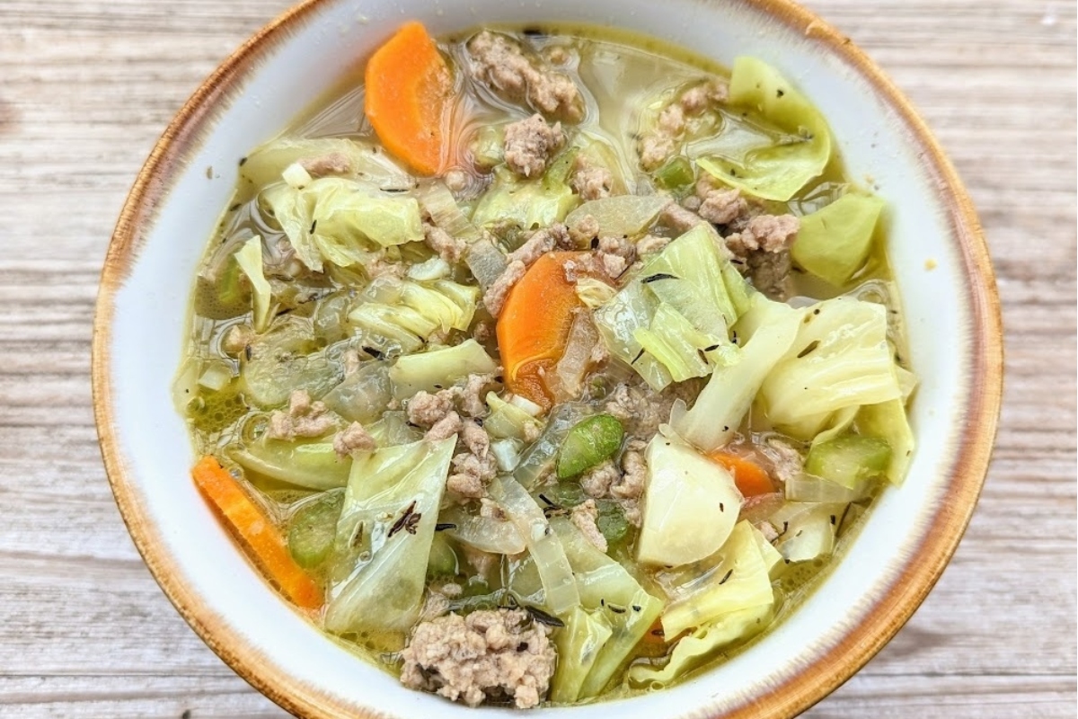 A low carb dinner of cabbage soup with meat and vegetables.