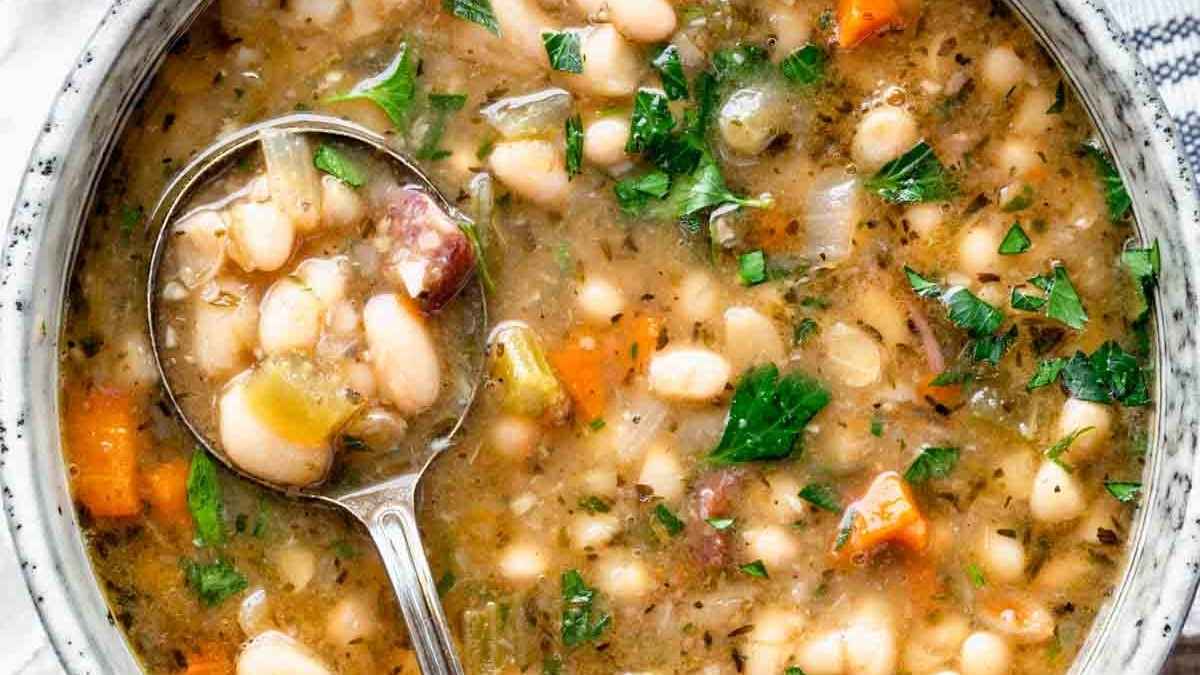 Ham and white bean soup in a bowl.