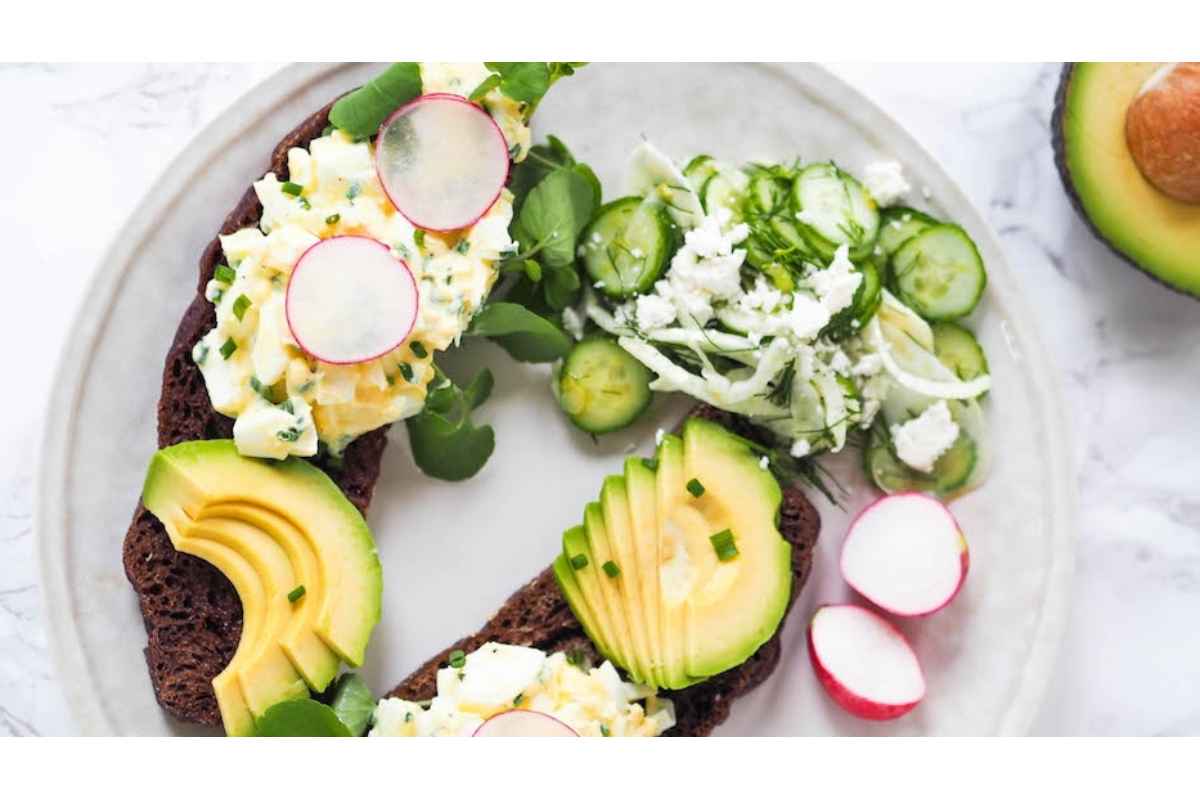 A plate with healthy avocado toast and high protein radishes.