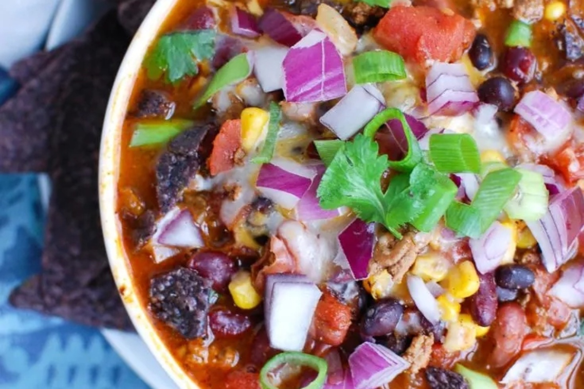 A game day favorite, this hearty bowl of chili is made even better with a side of crispy tortilla chips.