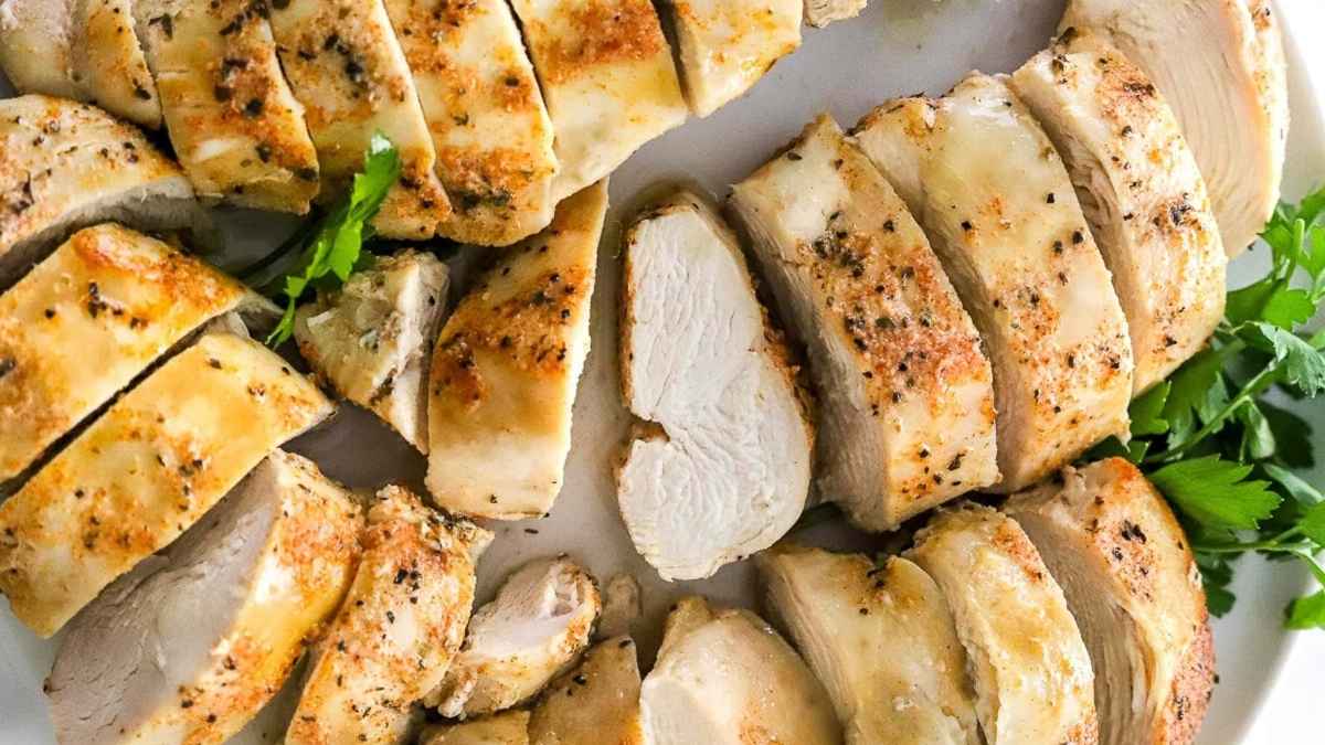 Slow cooker chicken dinners served on a white plate.