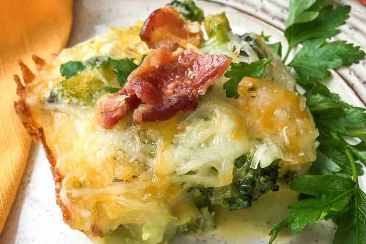 A delicious broccoli and cheese casserole recipe served on a plate.