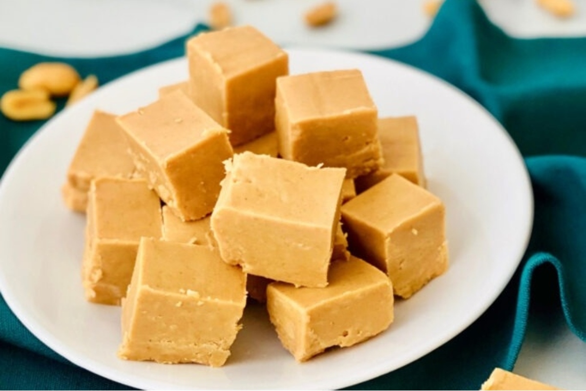 Christmas peanut butter fudge on a white plate.