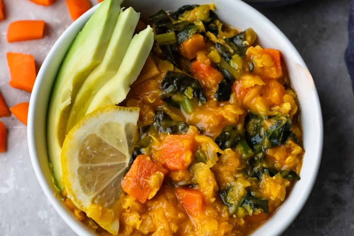 A stew with carrots and spinach.