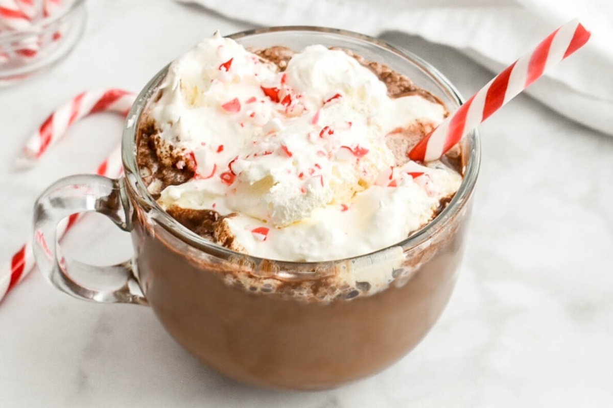 Recipe: Peppermint hot chocolate with whipped cream and candy canes.

This recipe combines the comforting flavors of hot chocolate with the refreshing taste of peppermint. The rich and creamy beverage is garnished