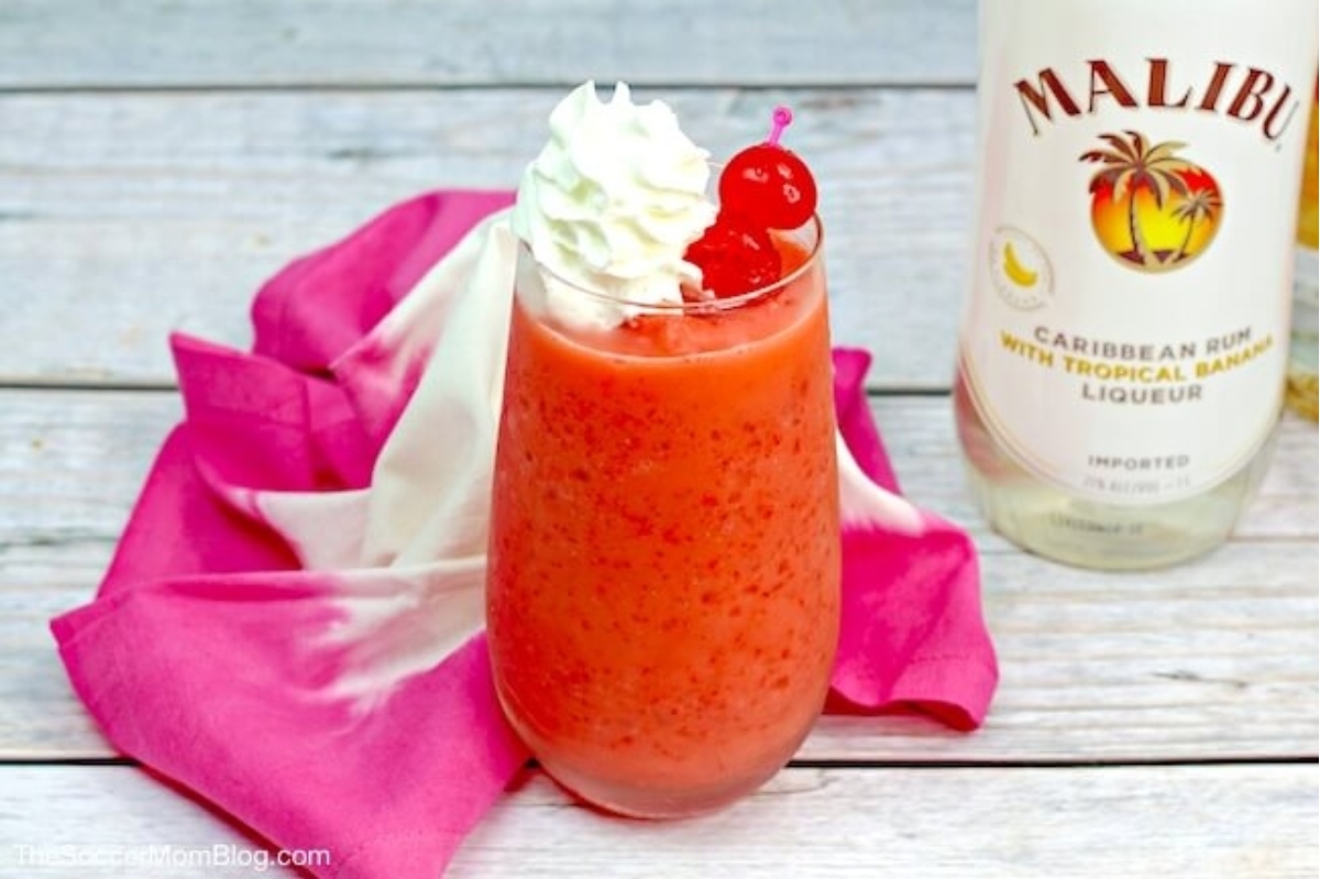 A romantic Valentine's Day cocktail, this pink drink is topped with whipped cream and includes a hint of rum for an extra touch of passion.