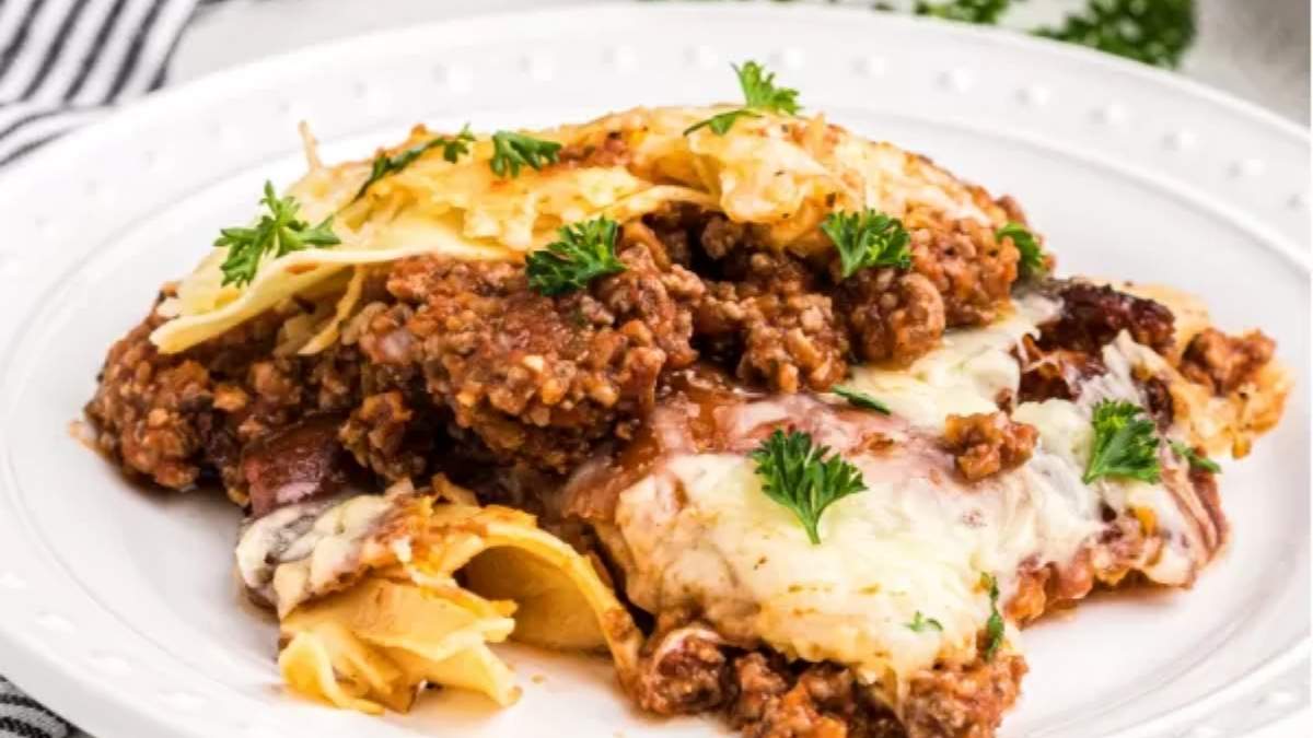 A shared plate of comforting lasagna recipe with meat and cheese.