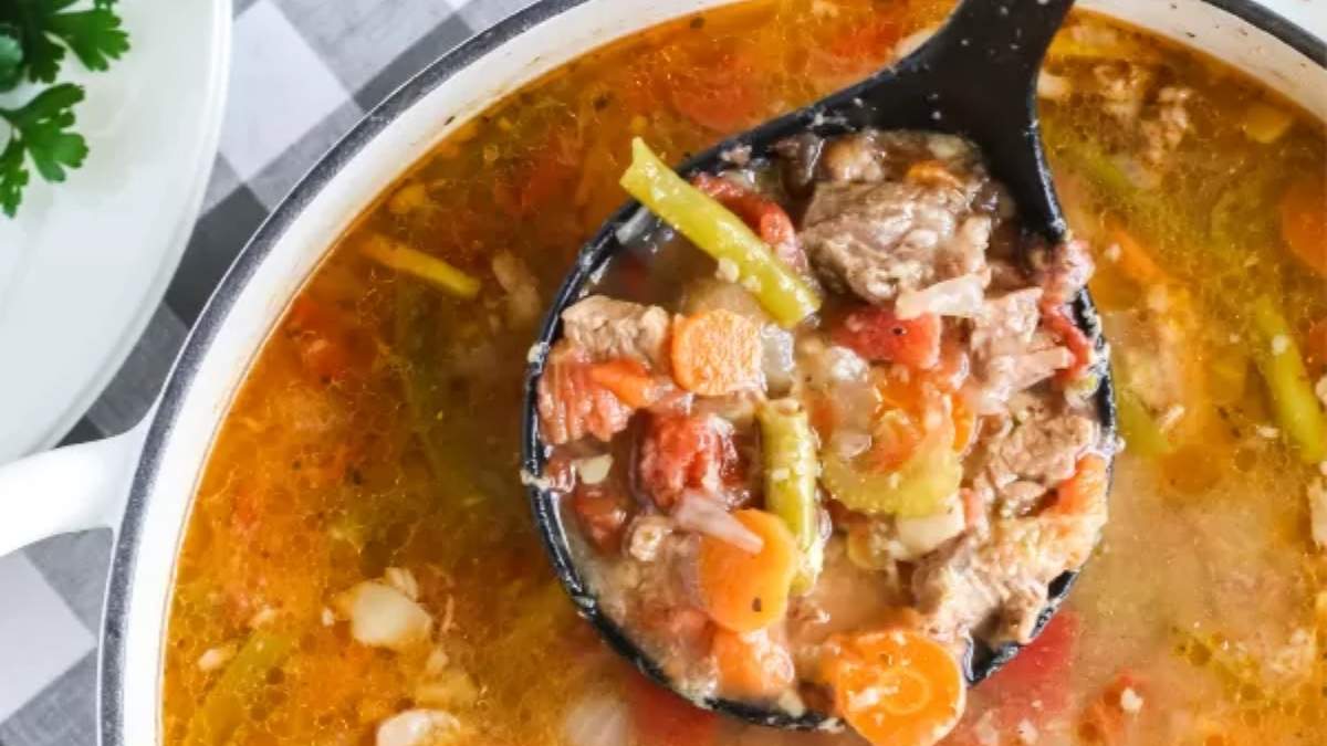 A pot of soup recipe, featuring a flavorful options with meat and vegetables.