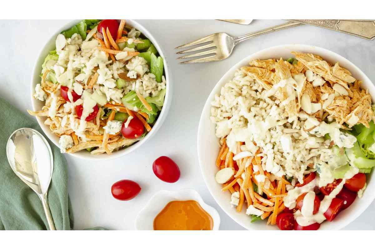 Two bowls of healthy chicken salad with high protein dressing for satisfying lunches.