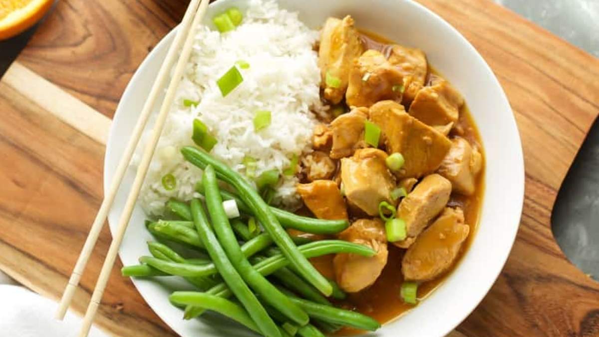 Orange chicken with vegetables on the side.