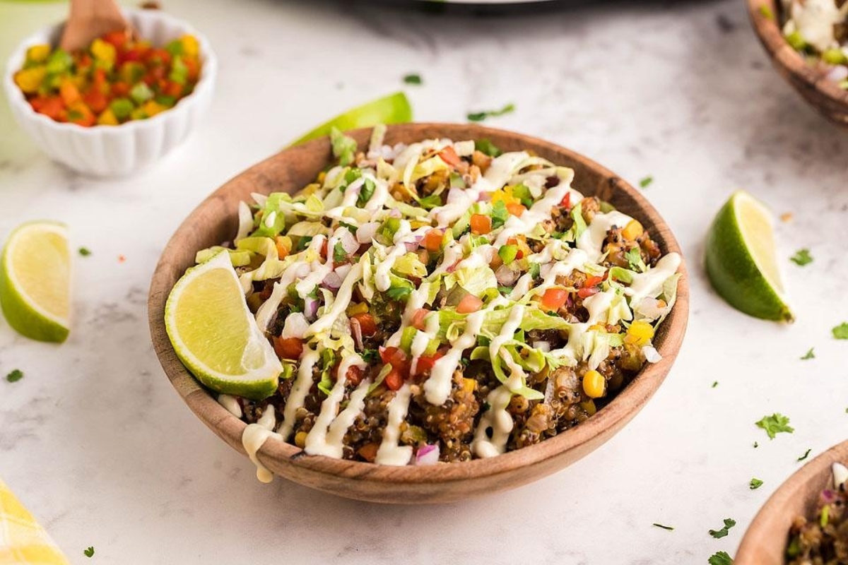 A wooden bowl filled with delicious Mexican meatballs, perfect for Taco Night dinners.