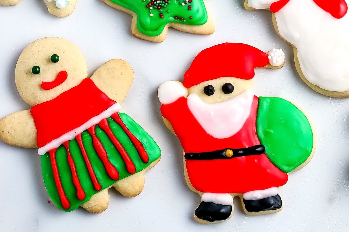 Festive Christmas cookies adorned with Santa Claus and gingerbread men.