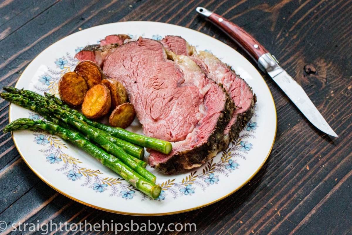 A savory winter beef recipe featuring roast beef, asparagus, and potatoes served on a plate.