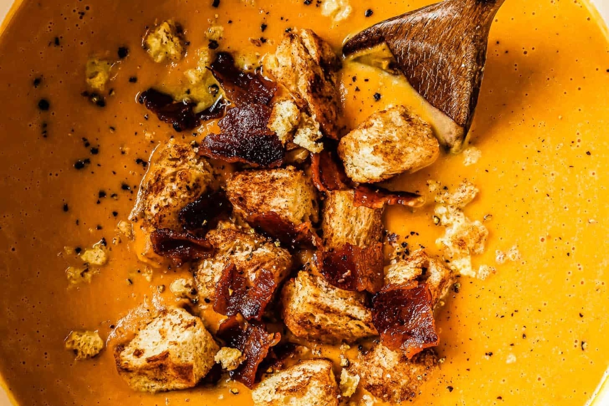 A delicious potato soup with crispy bacon and crunchy croutons.