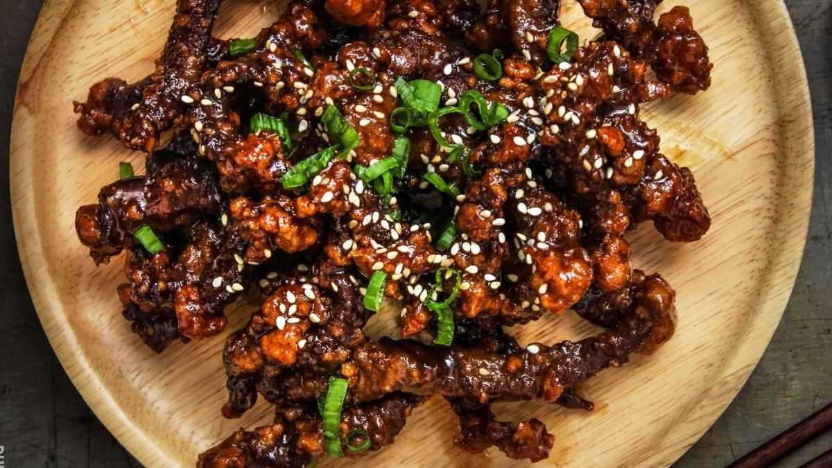 Sweet and sticky crispy beef on a plate.