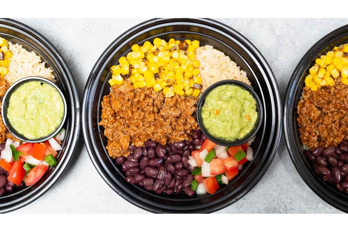 A group of healthy bowls of high protein food.