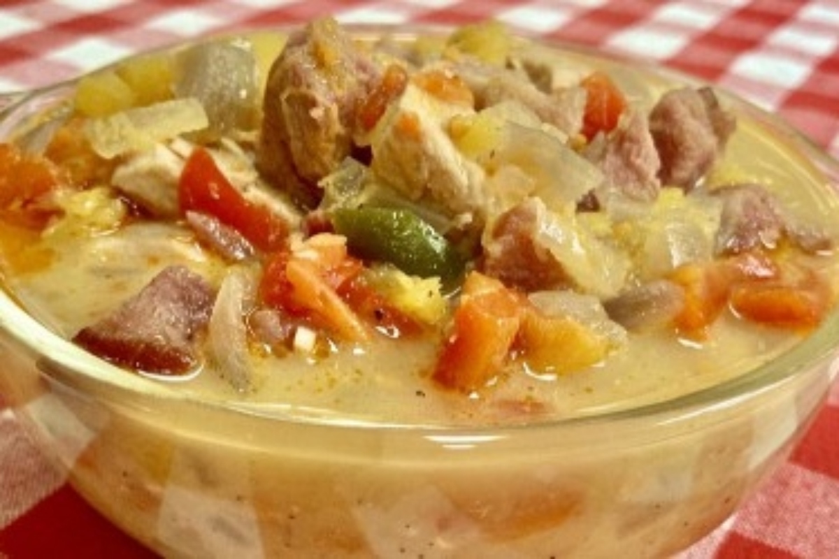 A savory chili recipe with a combination of meat and vegetables, simmered to perfection in a hearty bowl of soup.