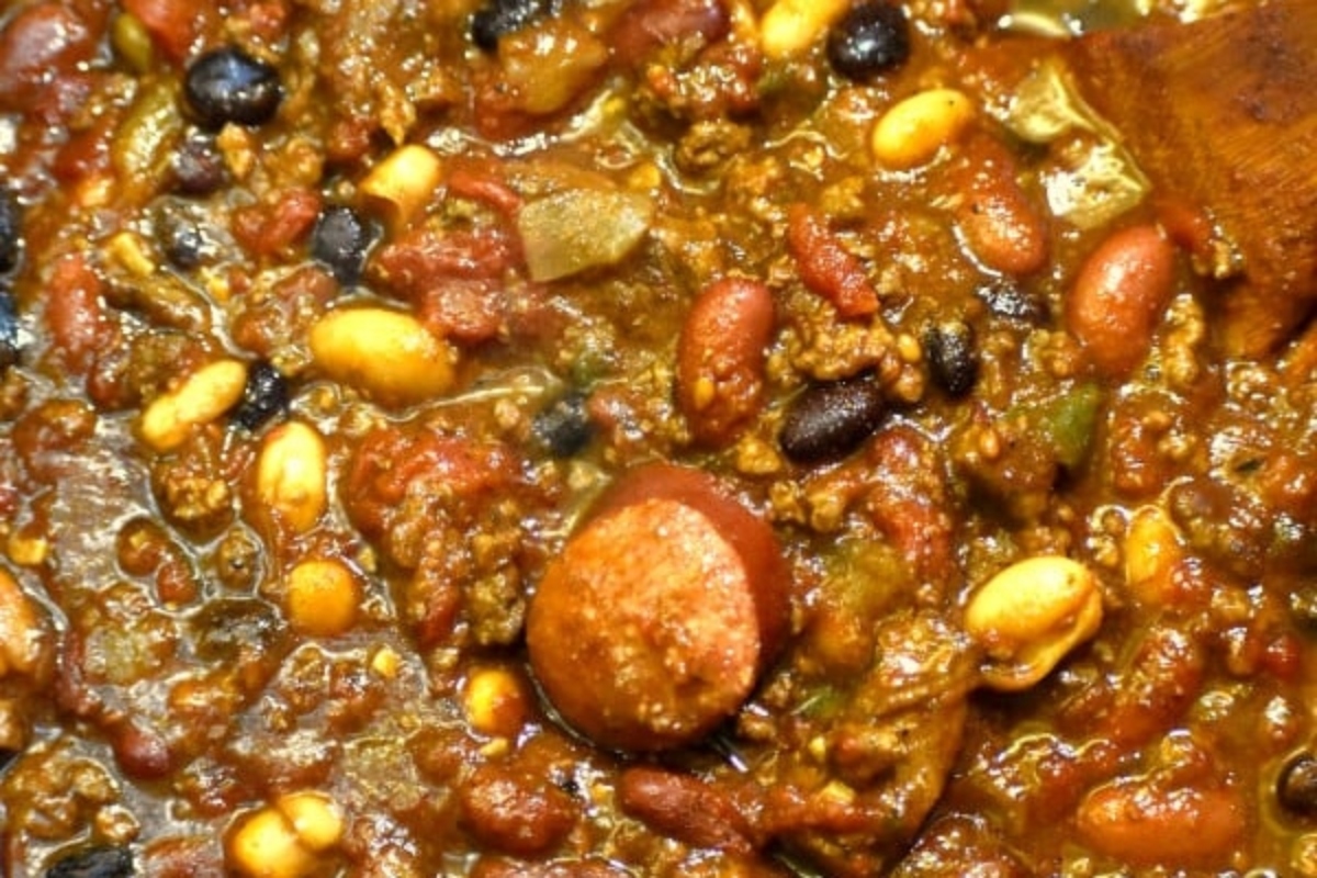 A close up of chili with beans.