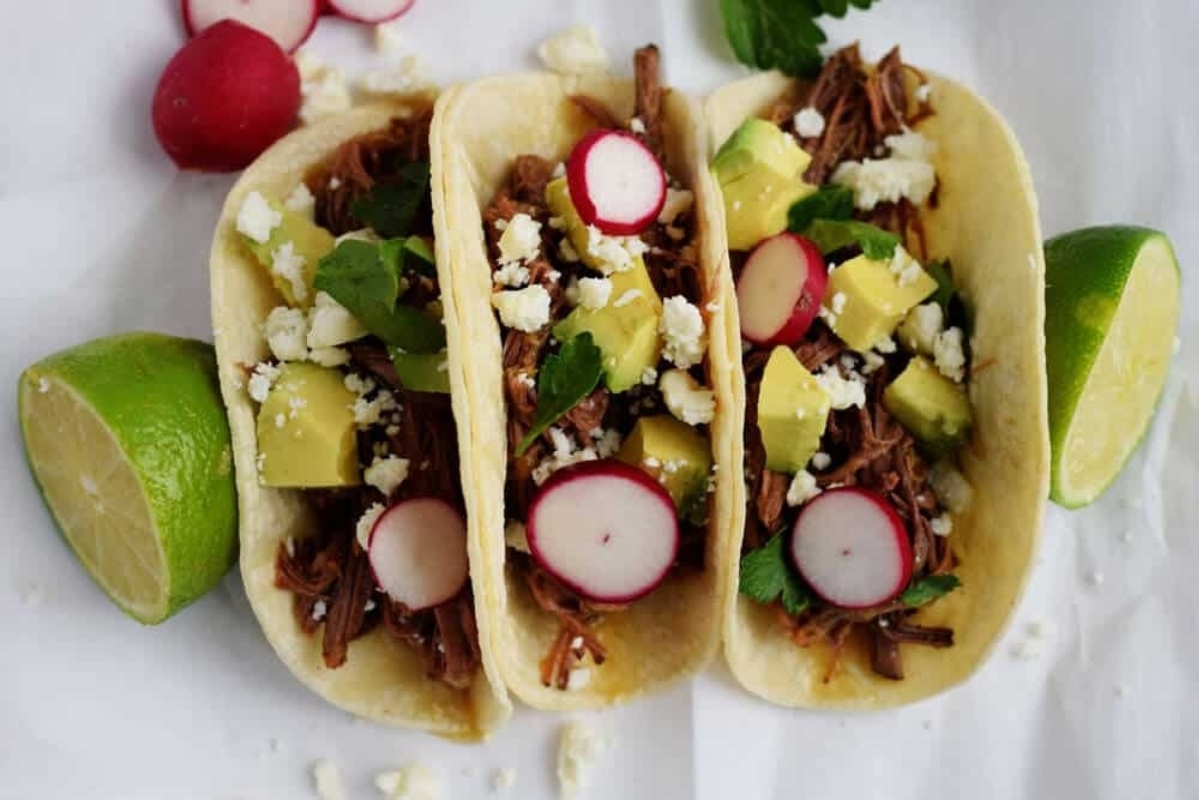 Three winter tacos with radishes.