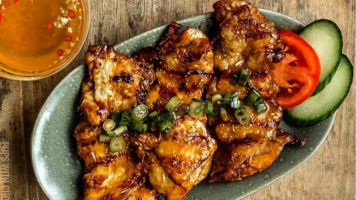 Lemongrass chicken with cucumber on the side.
