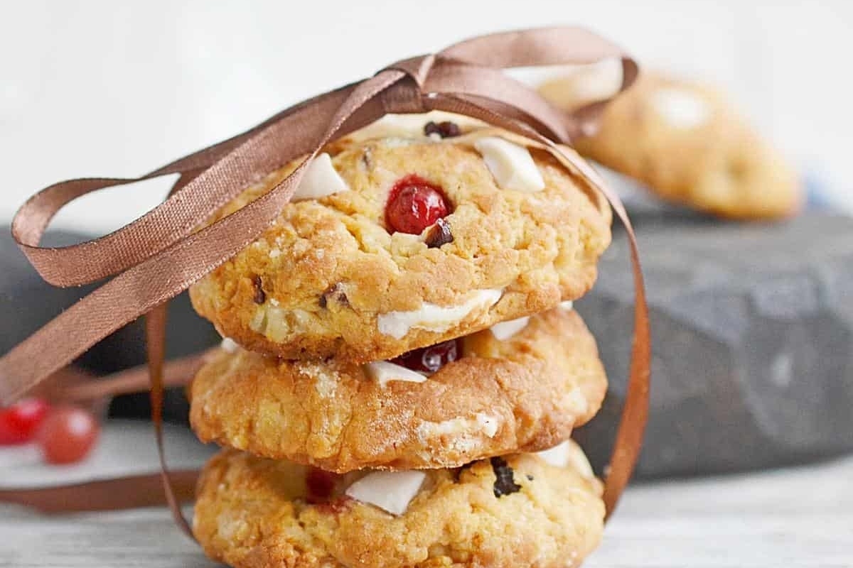 A stack of cranberry cookies smothered in icing.