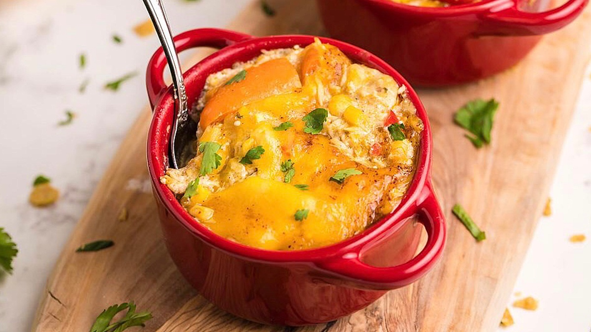Super Easy Slow Cooker Chicken Enchilada Casserole.