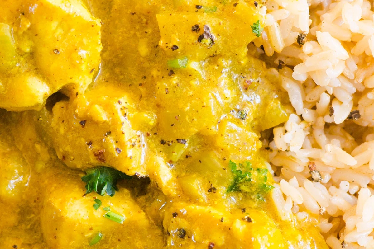 A delicious recipe for chicken and rice in a flavorful yellow curry.