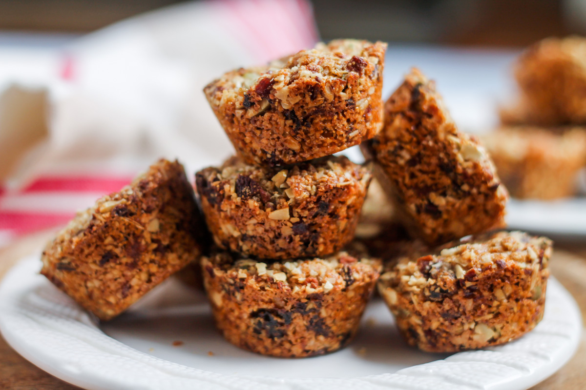 A stack of Aussie Bites copycat recipe muffins on a plate.