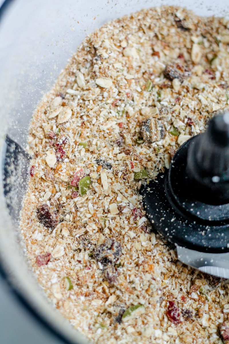 An Aussie Bites copycat recipe made with a food processor filled with granola and nuts.