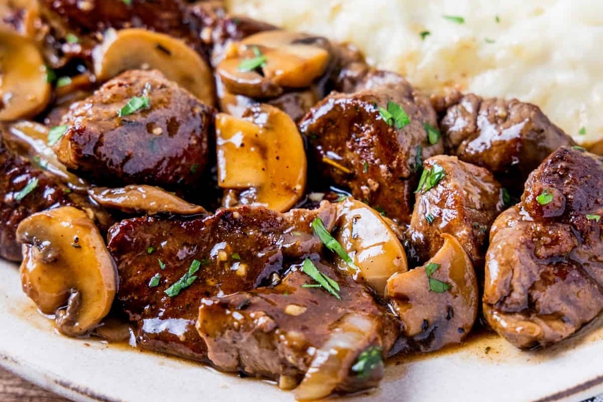 A comforting recipe for winter beef stew with mushrooms and mashed potatoes.