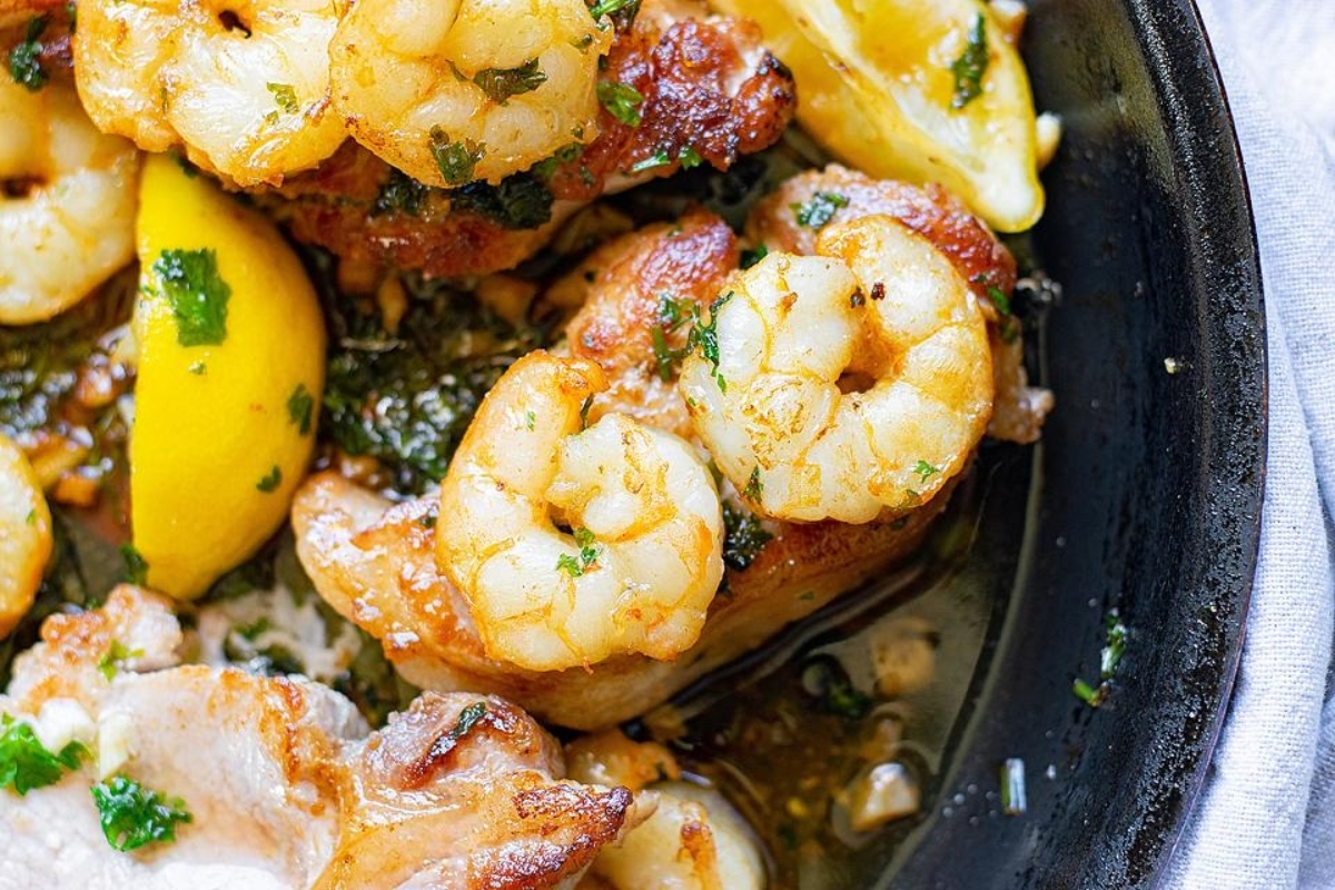 Butter Herbed Shrimp And Juicy Pan Seared Pork Chops