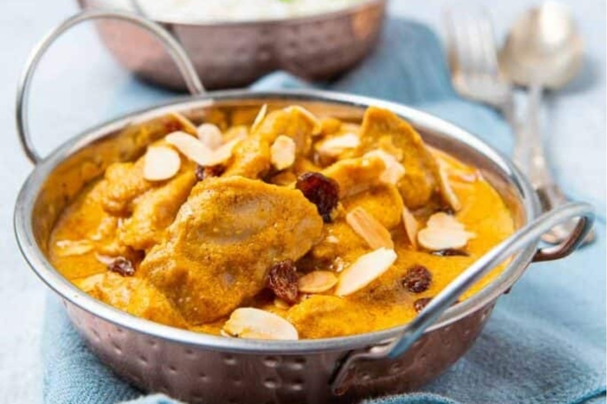 A warm winter dinner of chicken curry with rice and raisins.