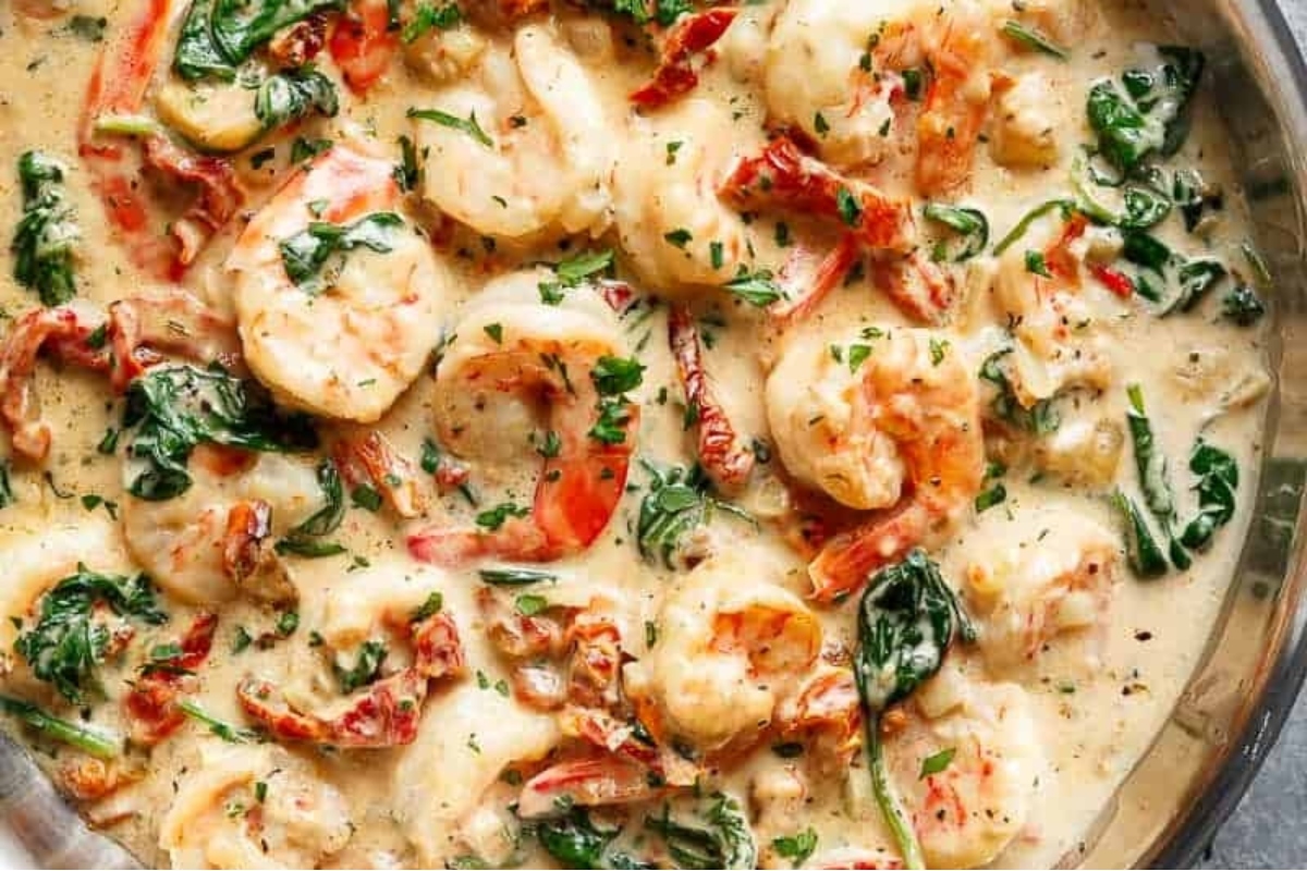 Explore delicious recipes featuring flavorful spinach and succulent shrimp cooked to perfection in a savory skillet.