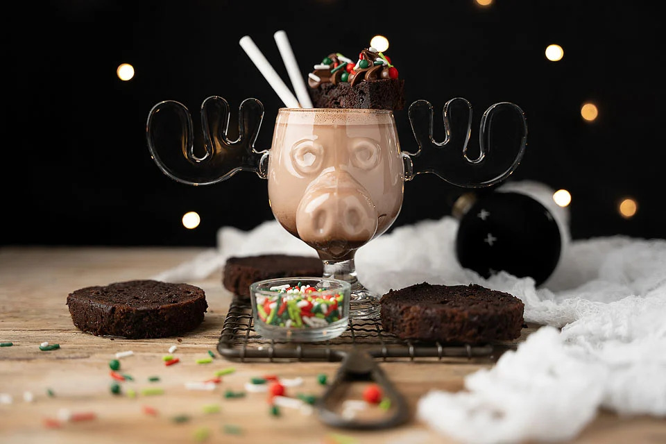 A festive chocolate milkshake with a moose on top, perfect for Christmas cocktails.