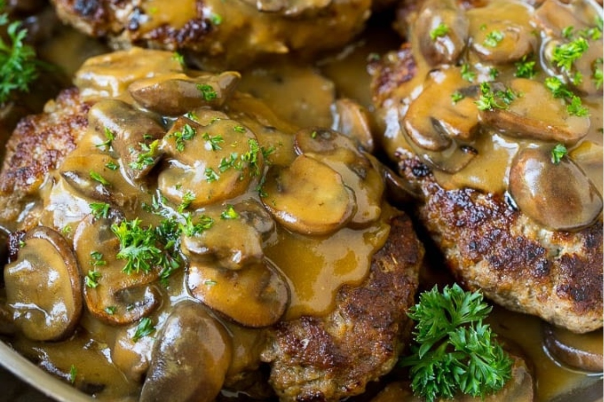 A savory skillet filled with mushrooms and gravy, perfect for comforting winter meals.