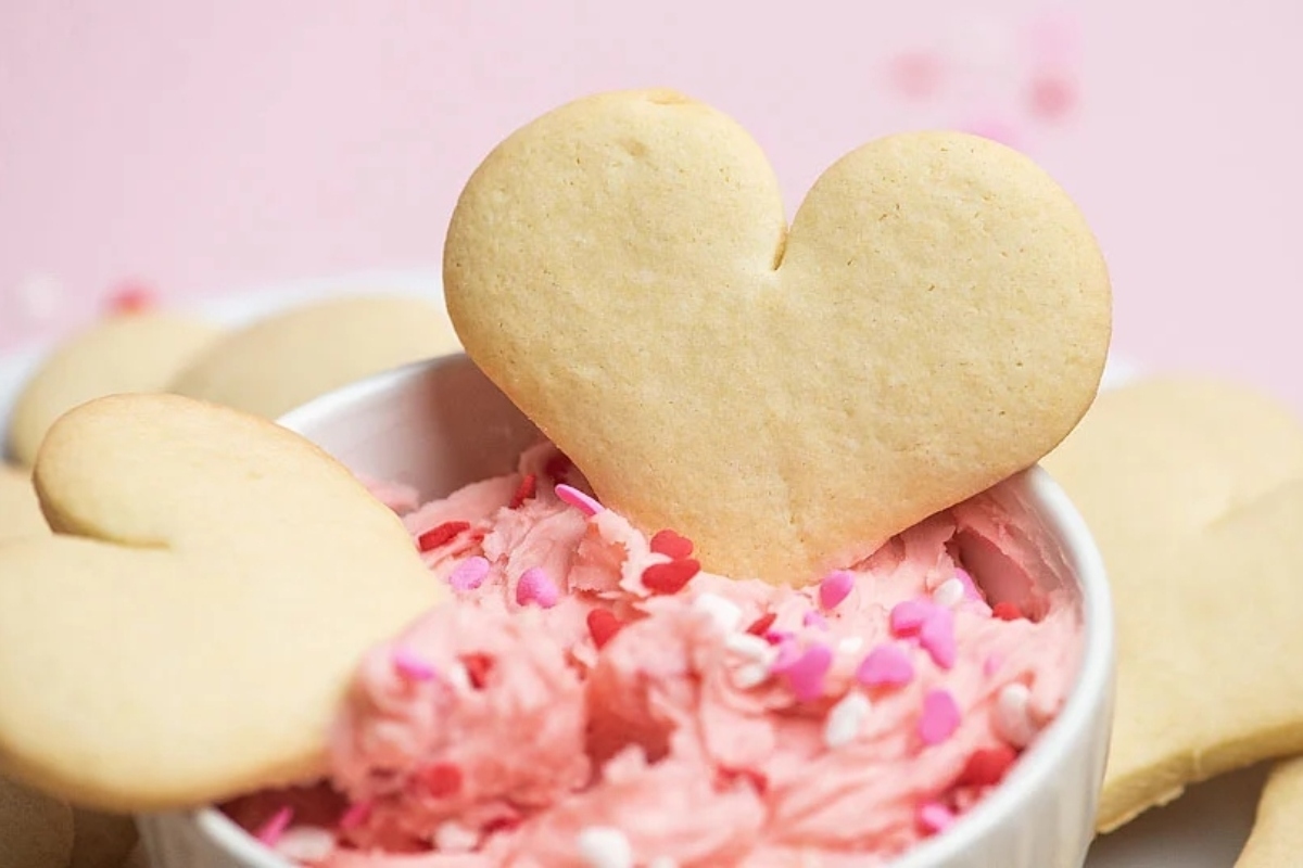 Valentine's day cookies in a bowl with sprinkles is the perfect dessert for a romantic Day celebration.