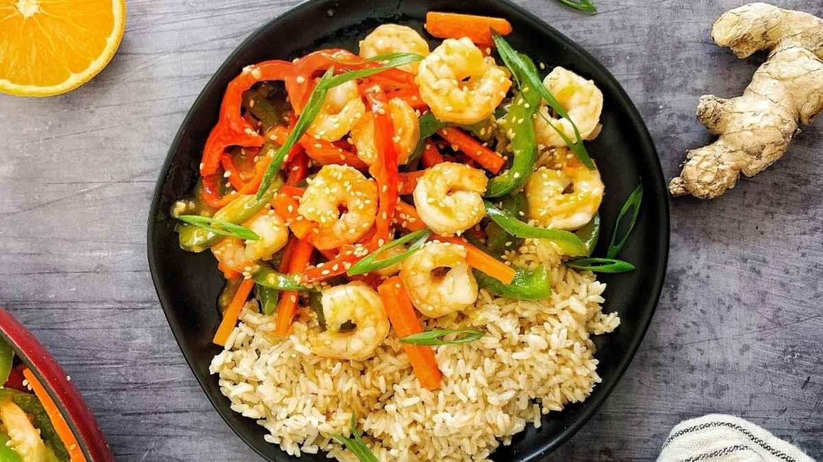Honey orange shrimp on a plate.
